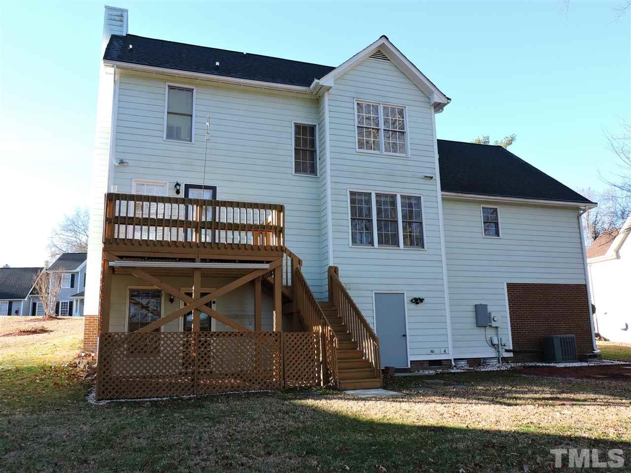 4325 Willow Lake Road Raleigh, NC 27616 - Photo 22 of 25 a view of a house with a yard