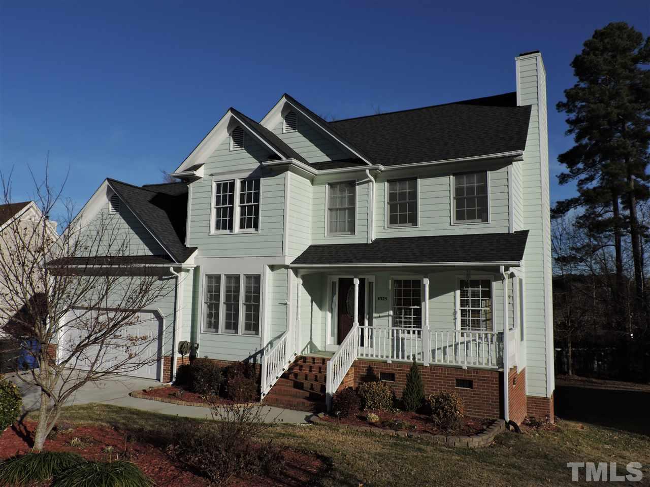 4325 Willow Lake Road Raleigh, NC 27616 - Photo 25 of 25 a front view of a house with a yard and garage