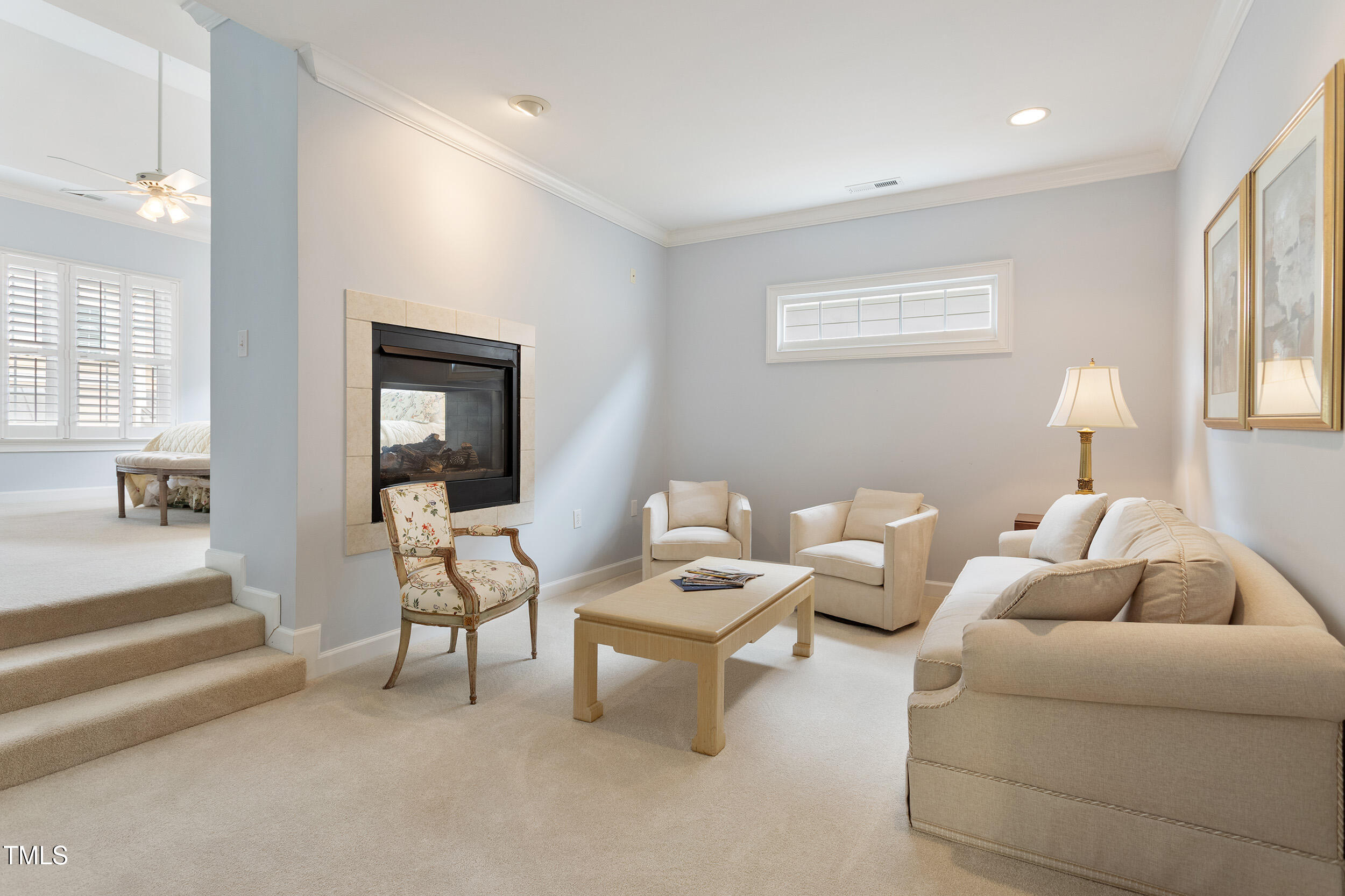 3928 Bentley Bridge Road Raleigh, NC 27612 - Photo 21 of 36 a living room with furniture and a potted plant