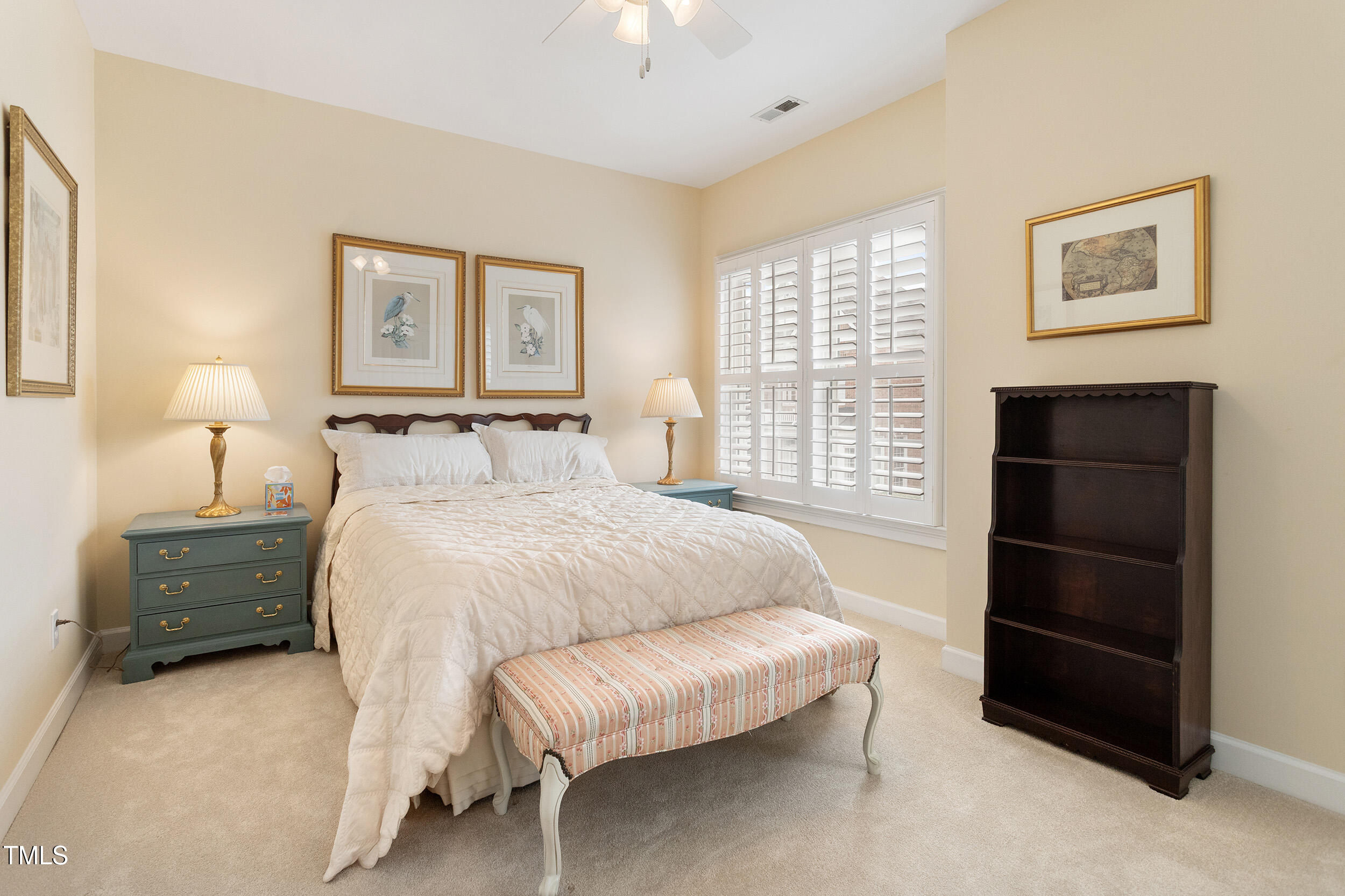 3928 Bentley Bridge Road Raleigh, NC 27612 - Photo 26 of 36 a bedroom with a bed and a window