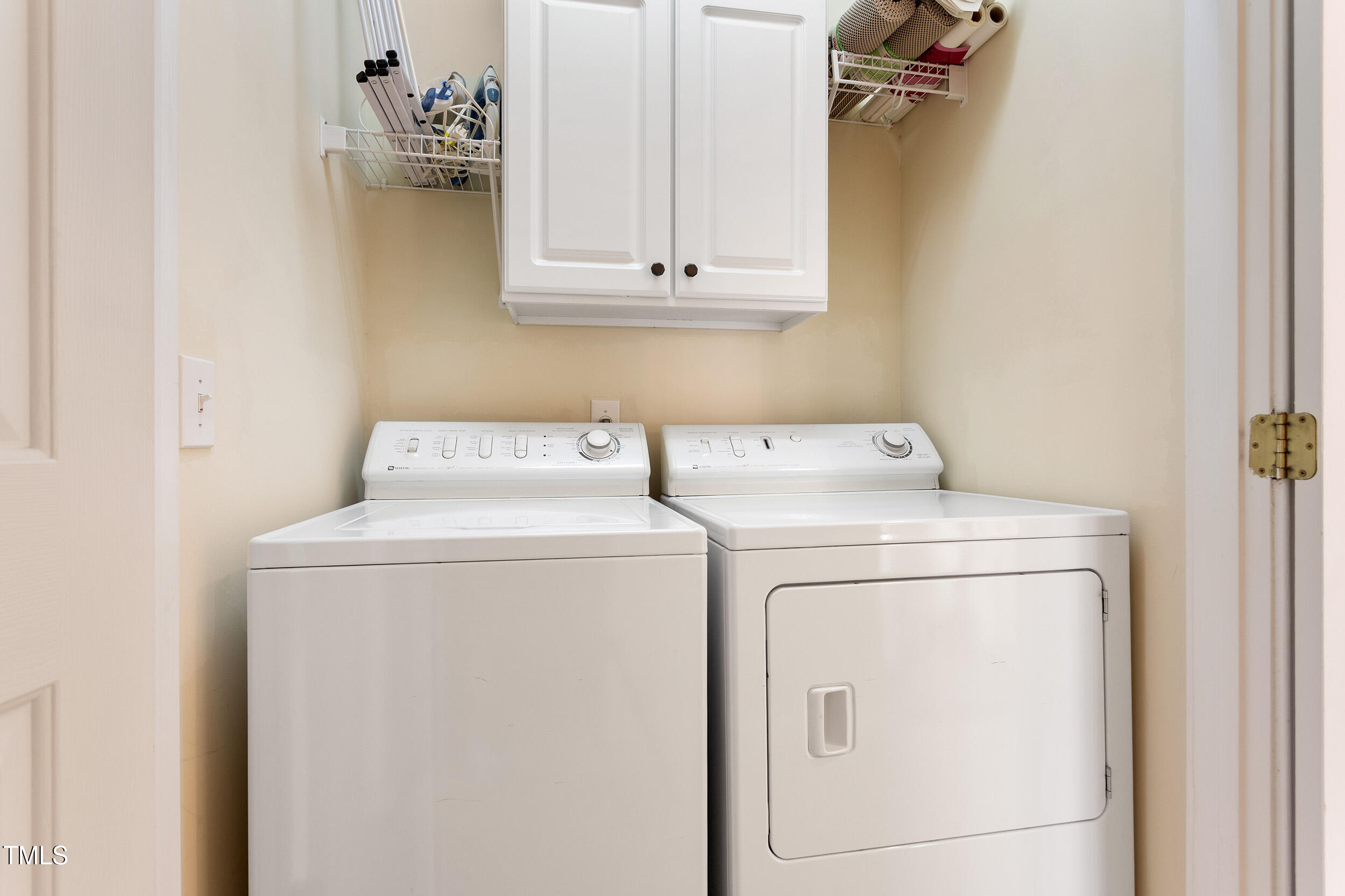 3928 Bentley Bridge Road Raleigh, NC 27612 - Photo 30 of 36 a utility room with dryer and washer