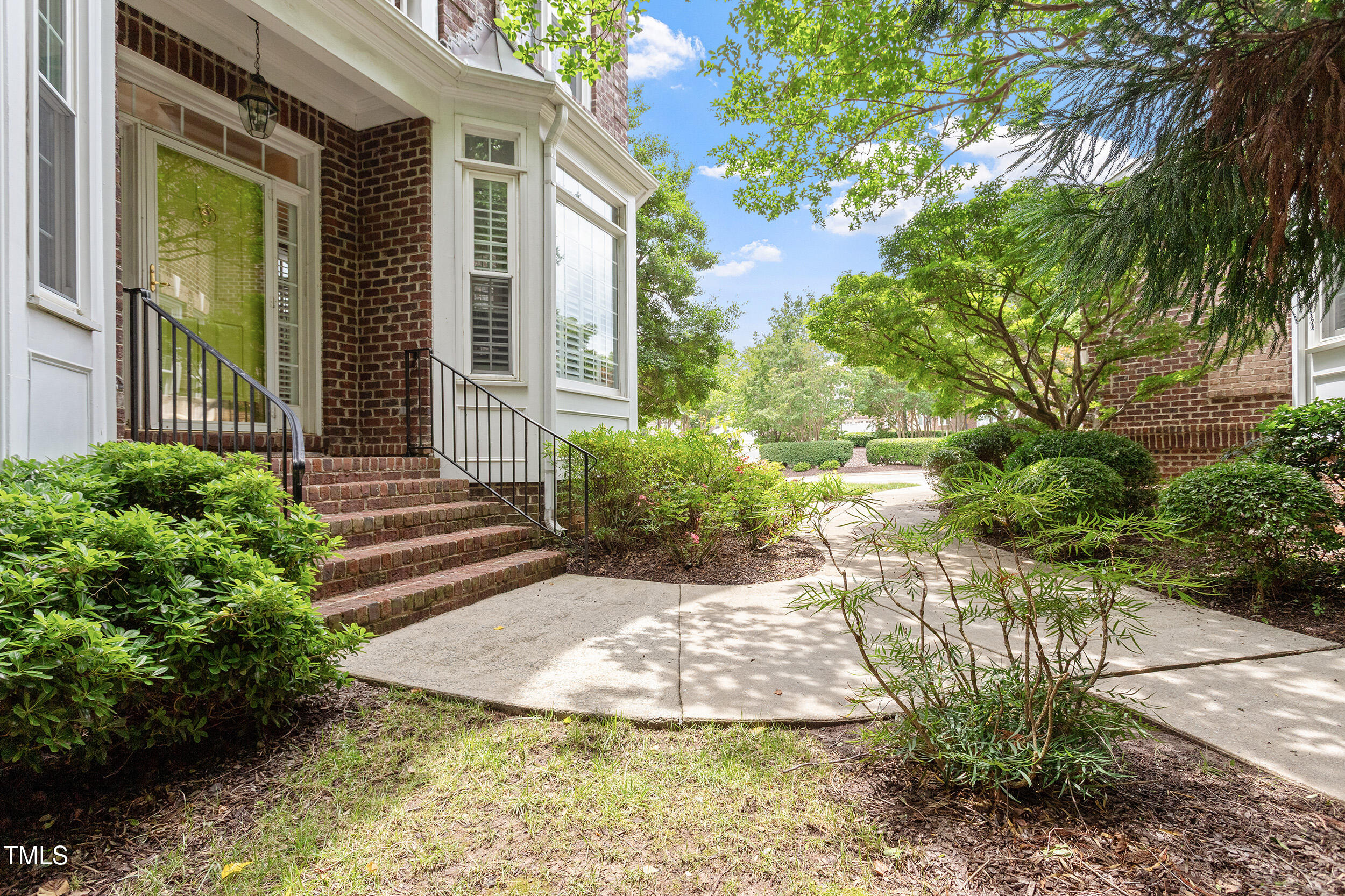 3928 Bentley Bridge Road Raleigh, NC 27612 - Photo 33 of 36 a view of a house with a yard and tree s