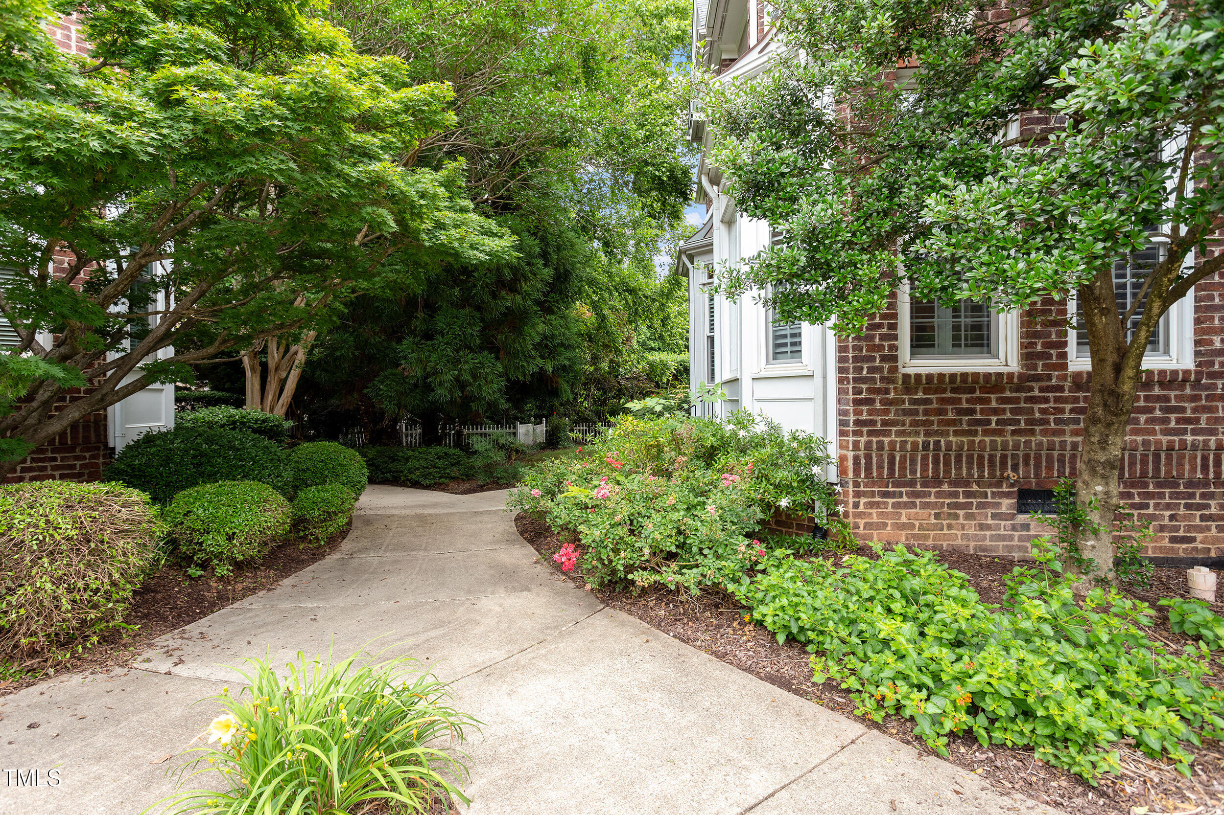3928 Bentley Bridge Road Raleigh, NC 27612 - Photo 34 of 36 a view of a house with a yard