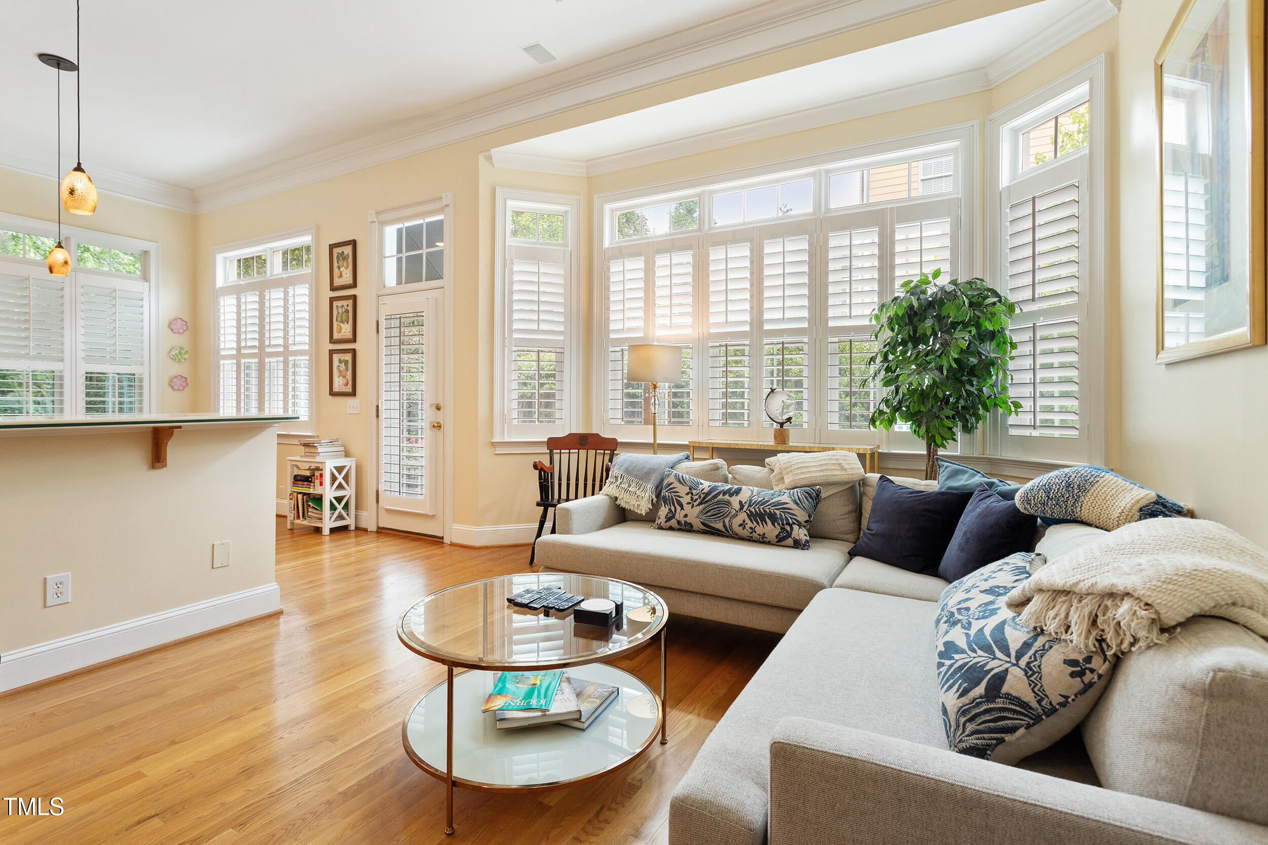 3928 Bentley Bridge Road Raleigh, NC 27612 - Photo 10 of 36 a living room with furniture and a large window