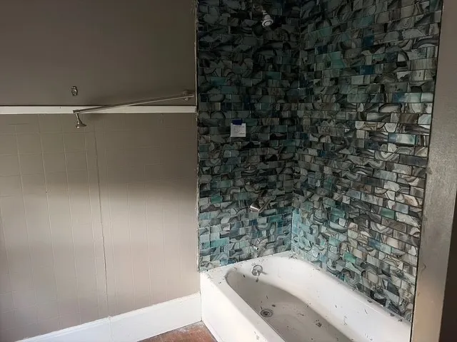 a bathroom with a bathtub