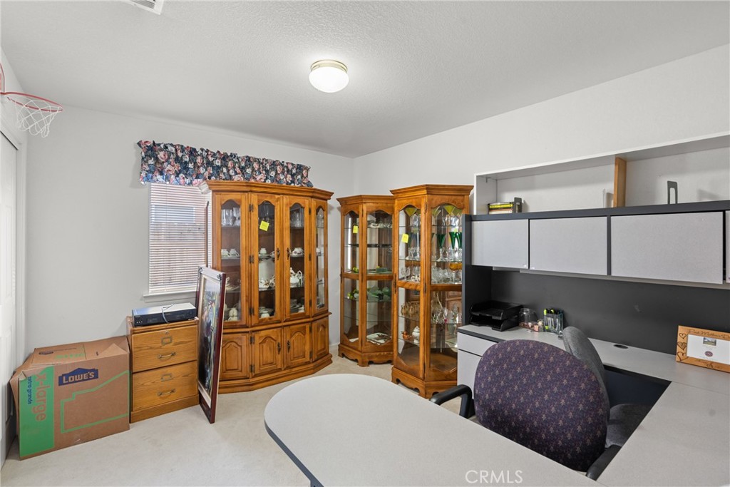781 Koval Lane Santa Maria, CA 93455 - Photo 20 of 33 a living room with furniture a lamp and a window
