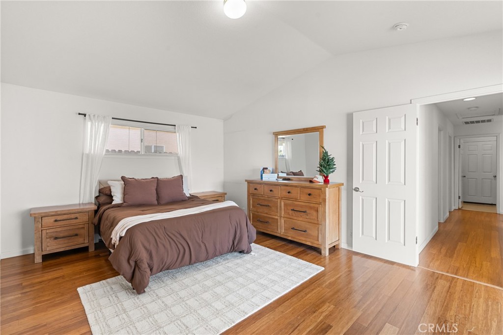 781 Koval Lane Santa Maria, CA 93455 - Photo 25 of 33 a bedroom with a bed and a dresser