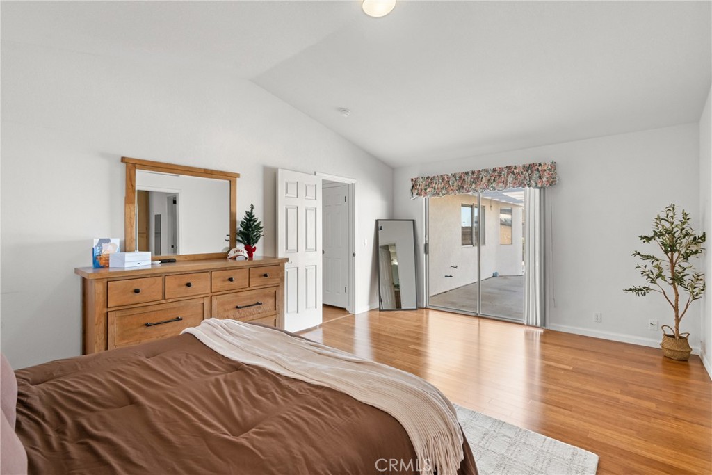 781 Koval Lane Santa Maria, CA 93455 - Photo 26 of 33 a bedroom with a bed and a dresser