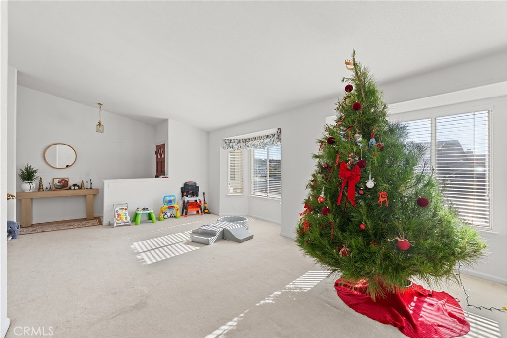 781 Koval Lane Santa Maria, CA 93455 - Photo 5 of 33 a living room with furniture and a potted plant