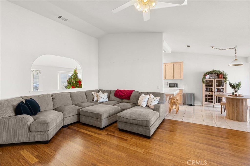 781 Koval Lane Santa Maria, CA 93455 - Photo 9 of 33 a living room with furniture and a wooden floor