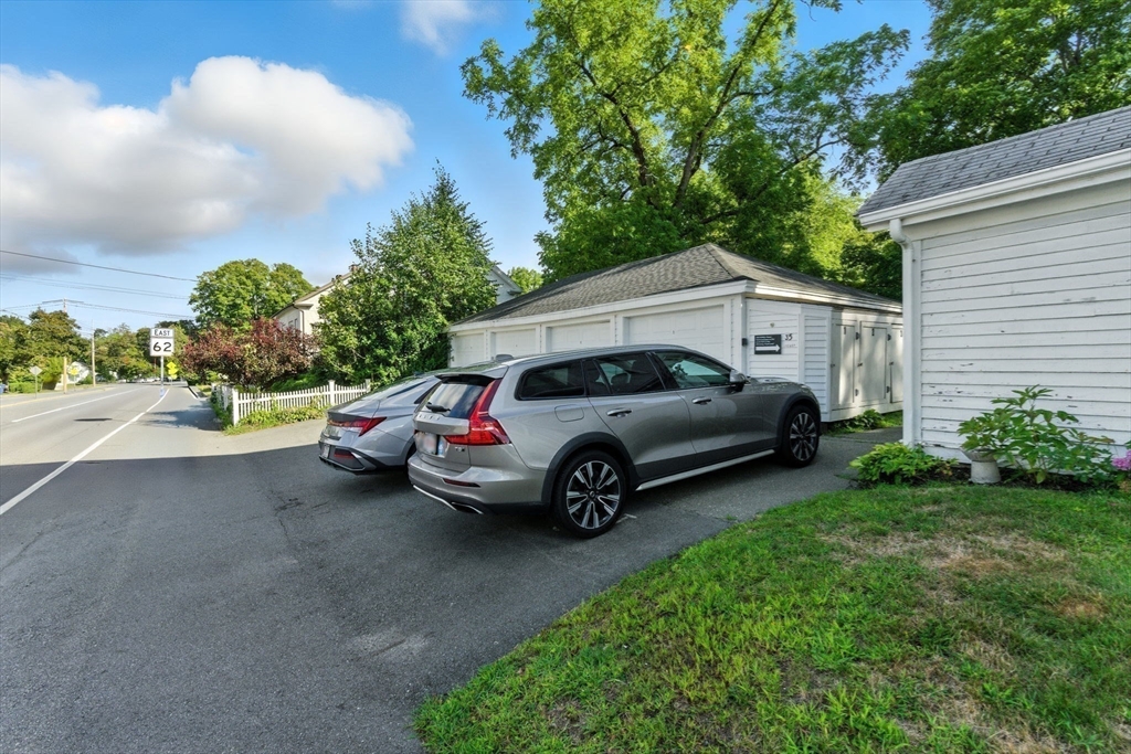 35 Locust Street, Unit 3 Danvers, MA 01923 - Photo 33 of 42 a view of a car in front of a house