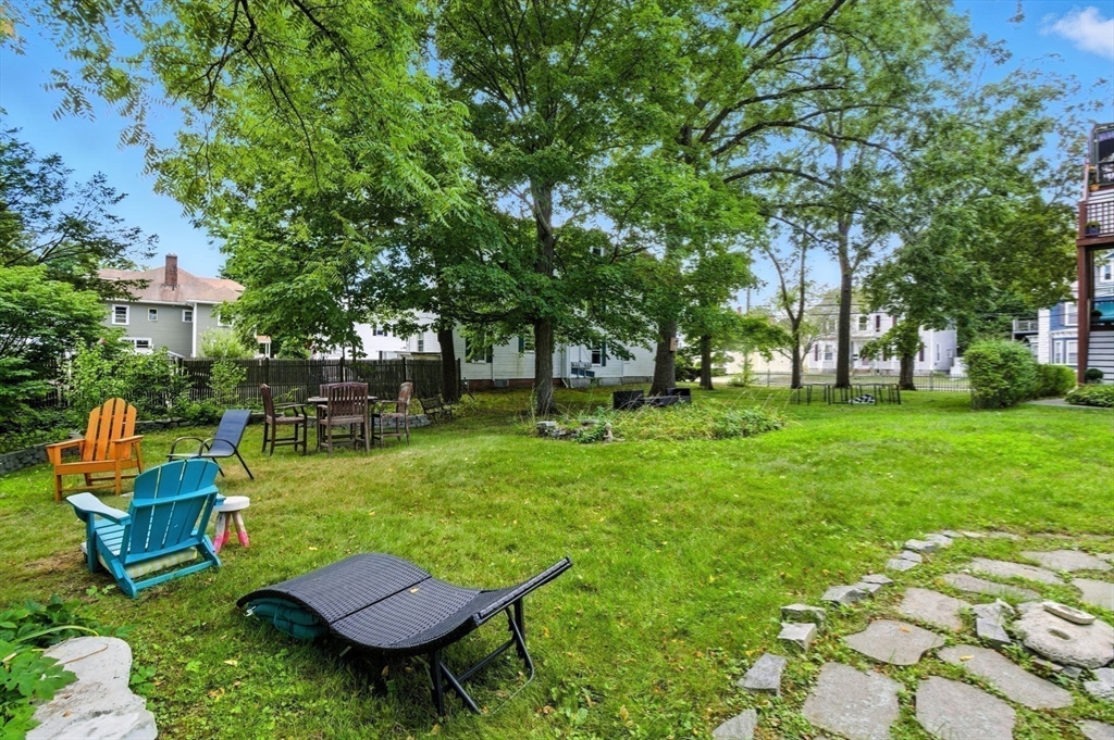 35 Locust Street, Unit 3 Danvers, MA 01923 - Photo 42 of 42 a view of a backyard with sitting area