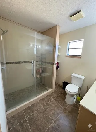 a bathroom with a toilet and a sink