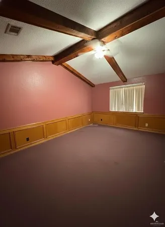 an empty room with a workbench