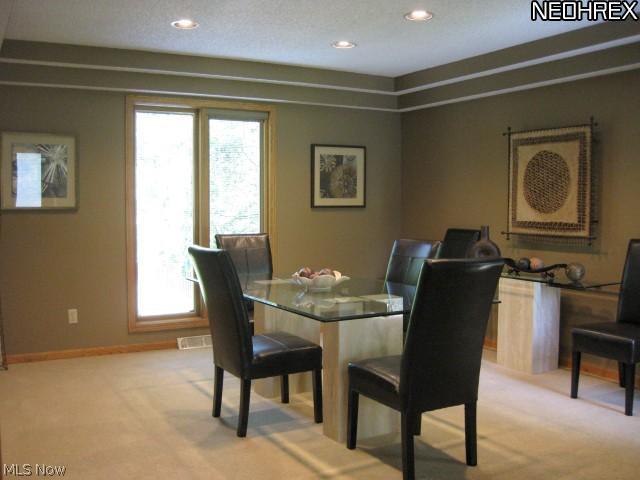 3921 Bramshaw Road Northwest Canton, OH 44718 - Photo 6 of 13 The dining room's trayed ceiling and spacious footprint make this the perfect room for your next dinner party.