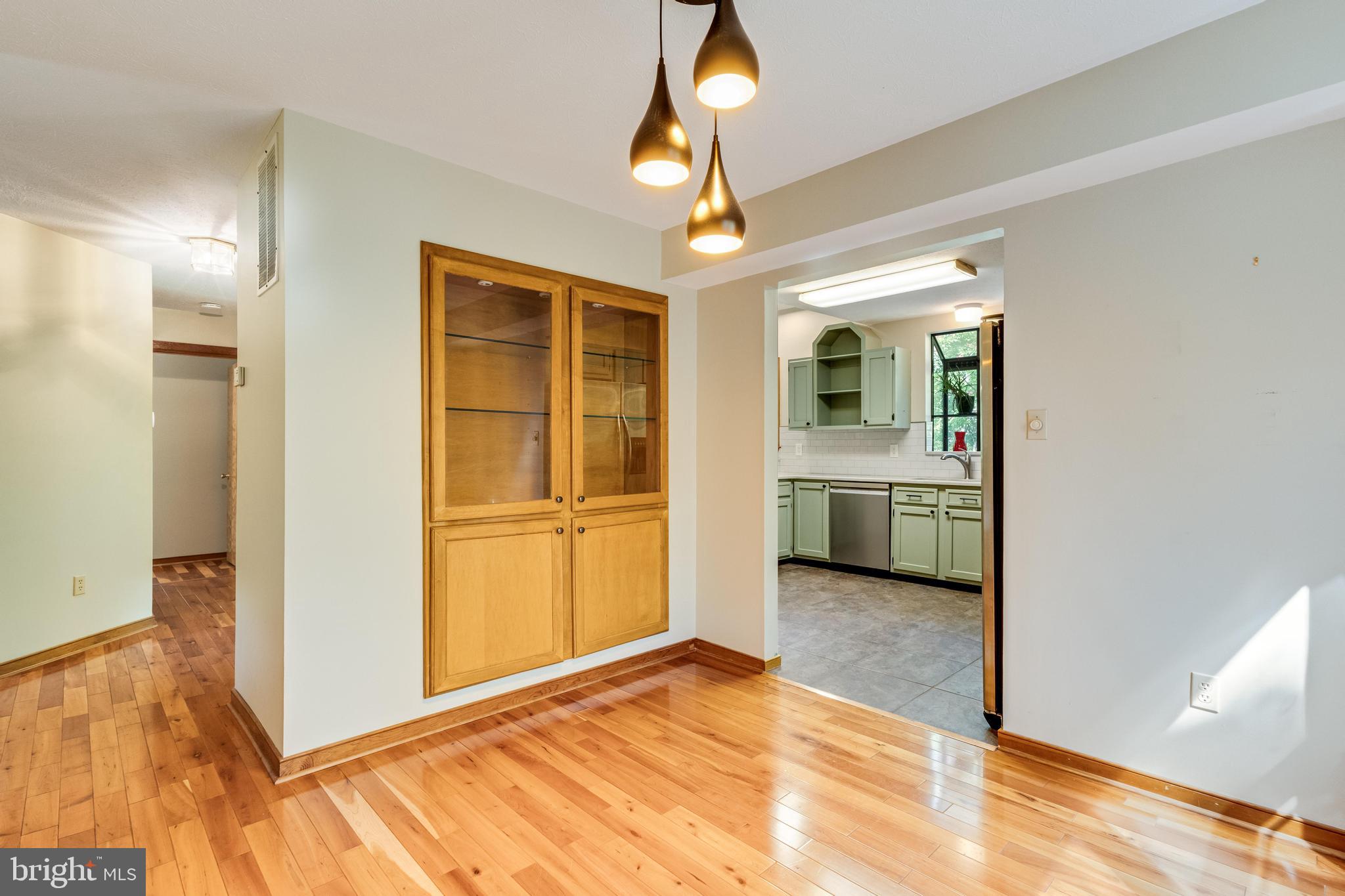 12954 Soundings Road Lusby, MD 20657 - Photo 7 of 56 Dining Room with Built-in Hutch