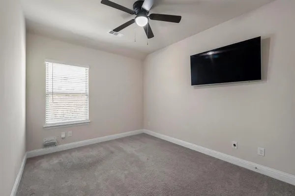 a view of a livingroom with a flat screen tv