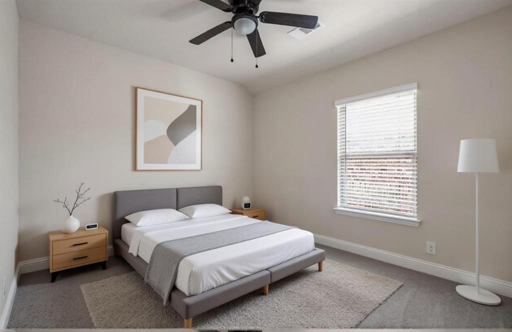 207 Congaree Road Allen, TX 75002 - Photo 25 of 31 Carpeted bedroom with baseboards and a ceiling fan