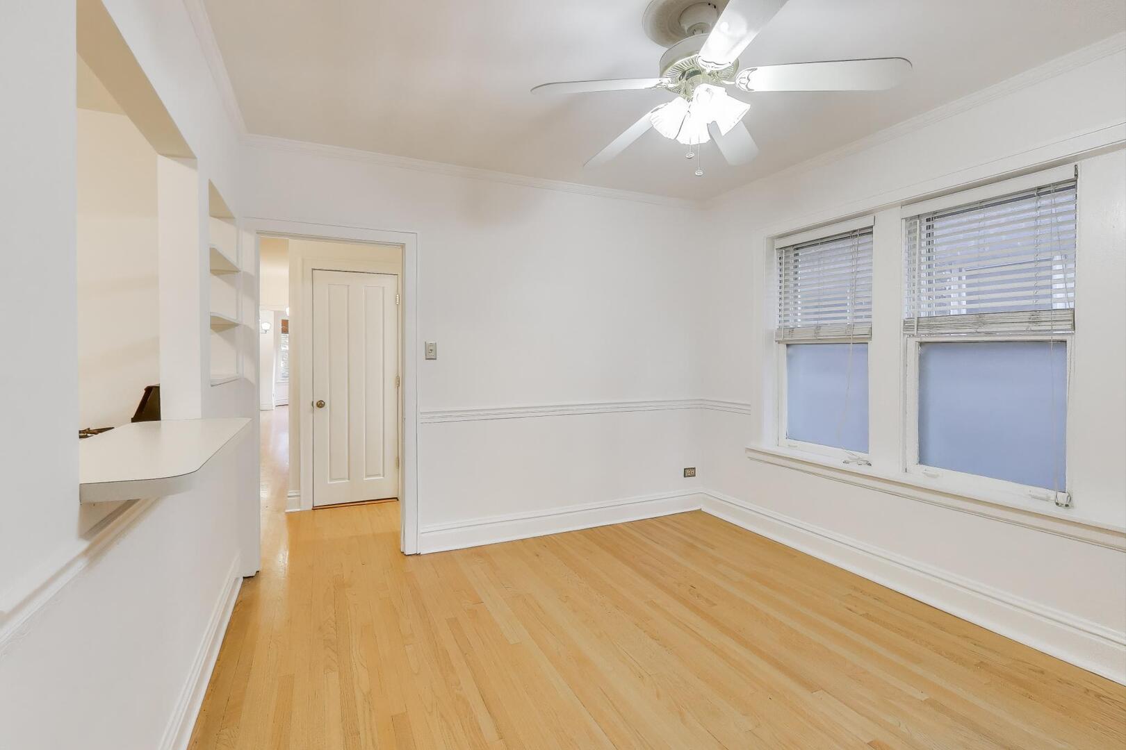 7346 Lake Street, Unit 2W River Forest, IL 60305 - Photo 14 of 30 a view of empty room with wooden floor and fan