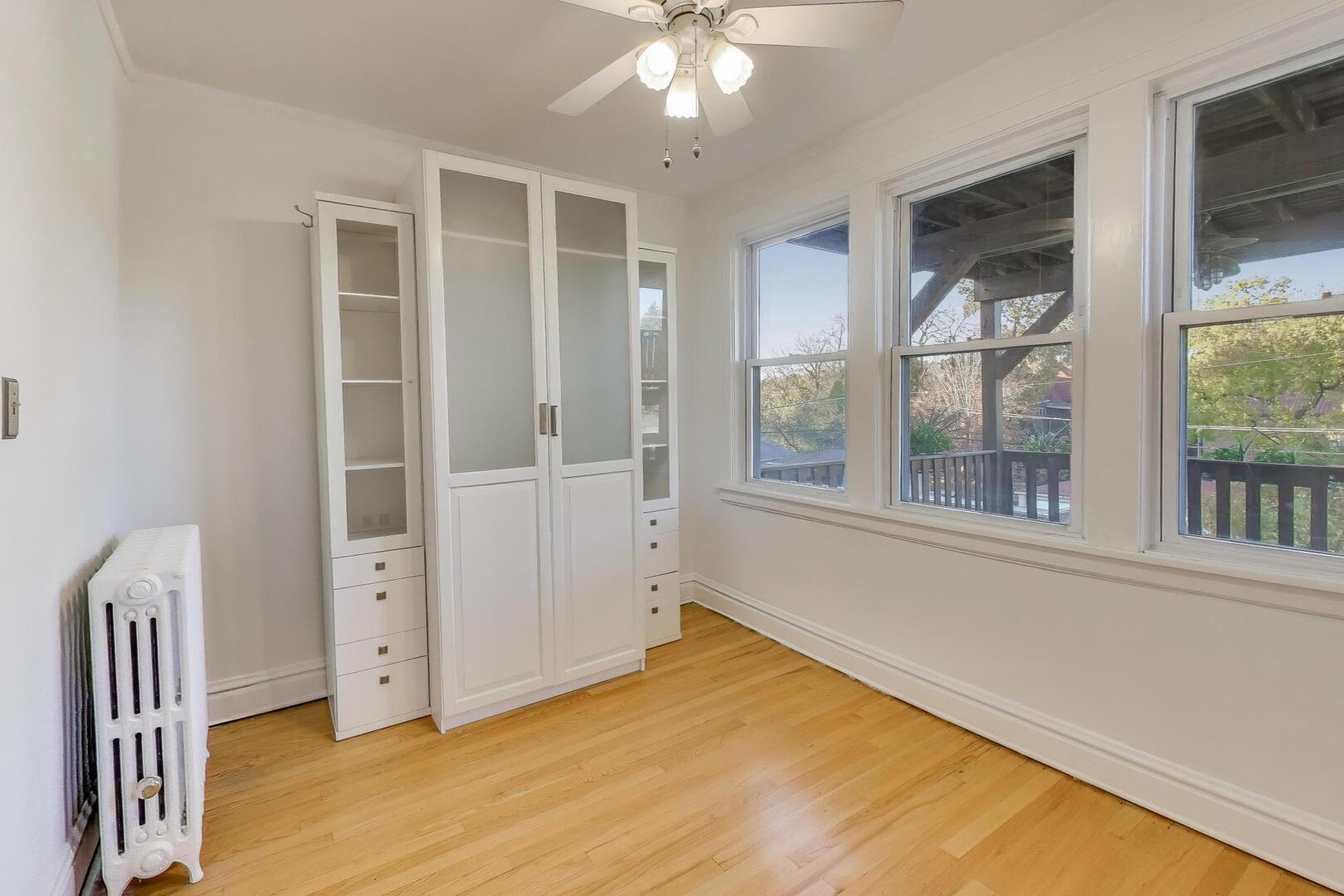 7346 Lake Street, Unit 2W River Forest, IL 60305 - Photo 18 of 30 wooden floor in an empty room with a window