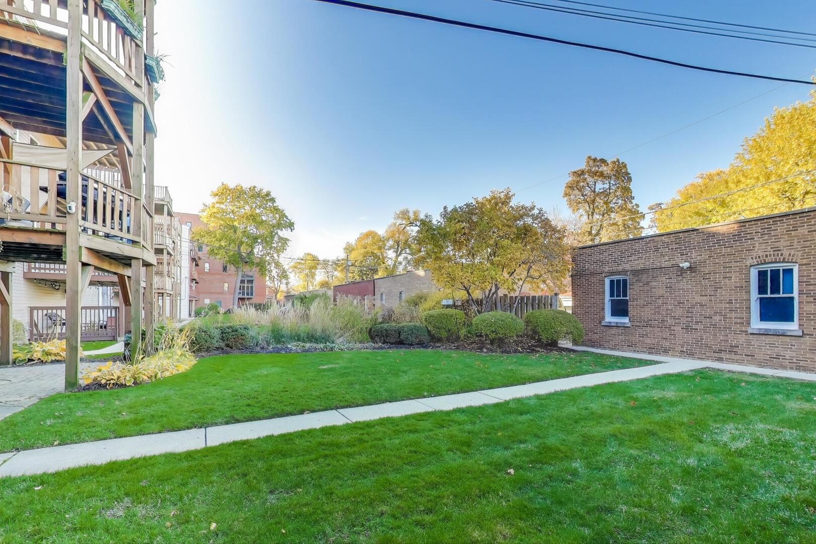 7346 Lake Street, Unit 2W River Forest, IL 60305 - Photo 29 of 30 a view of a house with a yard