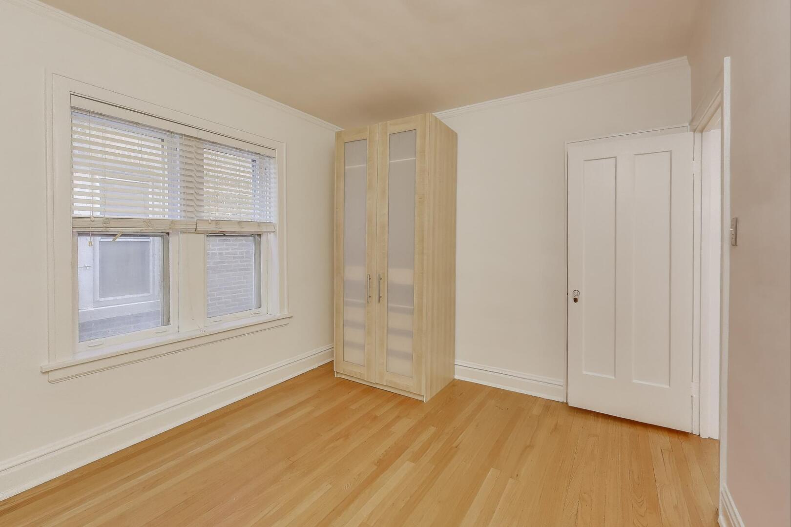 7346 Lake Street, Unit 2W River Forest, IL 60305 - Photo 10 of 30 a view of empty room with wooden floor and fan