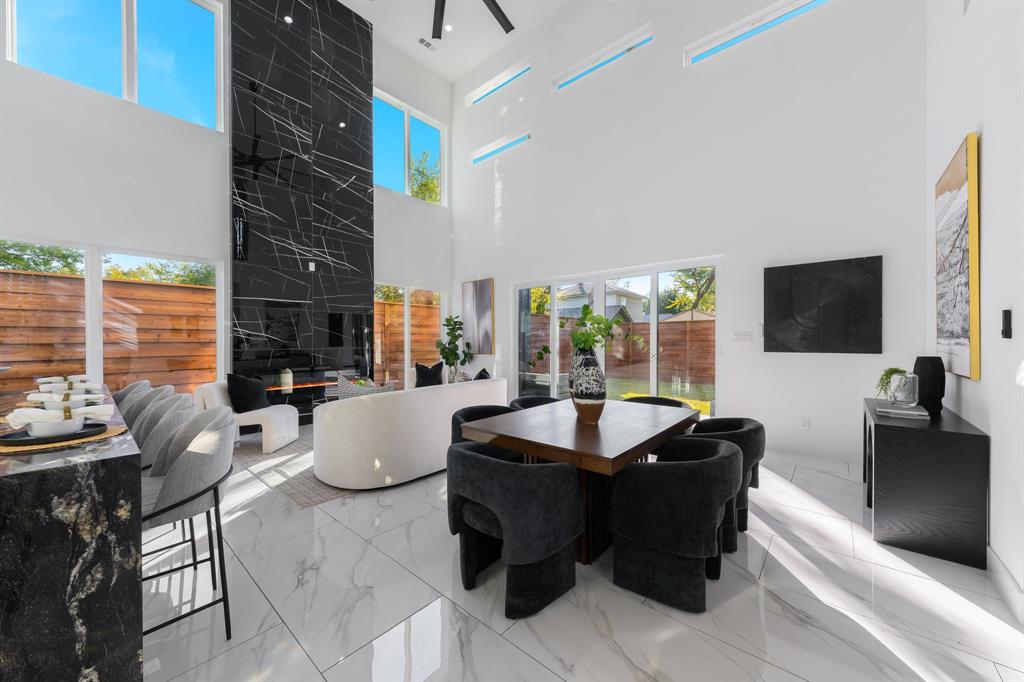 3351 Sylvan Avenue Dallas, TX 75212 - Photo 12 of 40 a living room with fireplace furniture and a flat screen tv