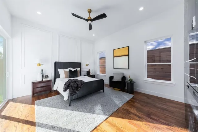 a bedroom with bed and window