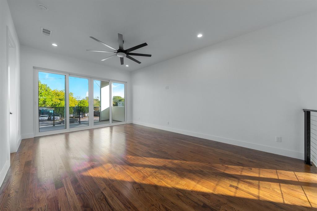 3351 Sylvan Avenue Dallas, TX 75212 - Photo 29 of 40 wooden floor in an empty room with a window