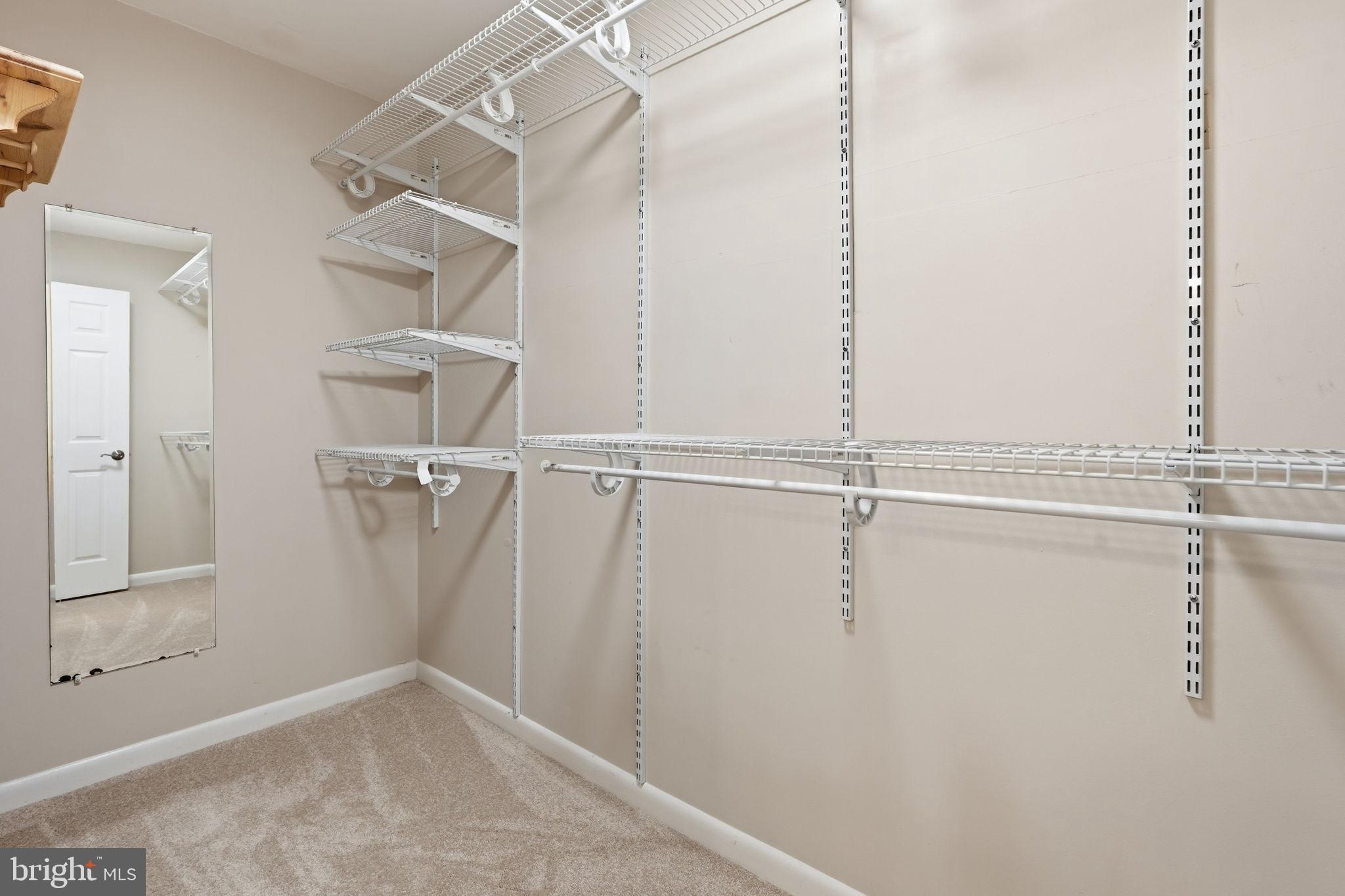 1942 Winterport Cl Reston, VA 20191 - Photo 14 of 19 a view of a room with racks on the wall