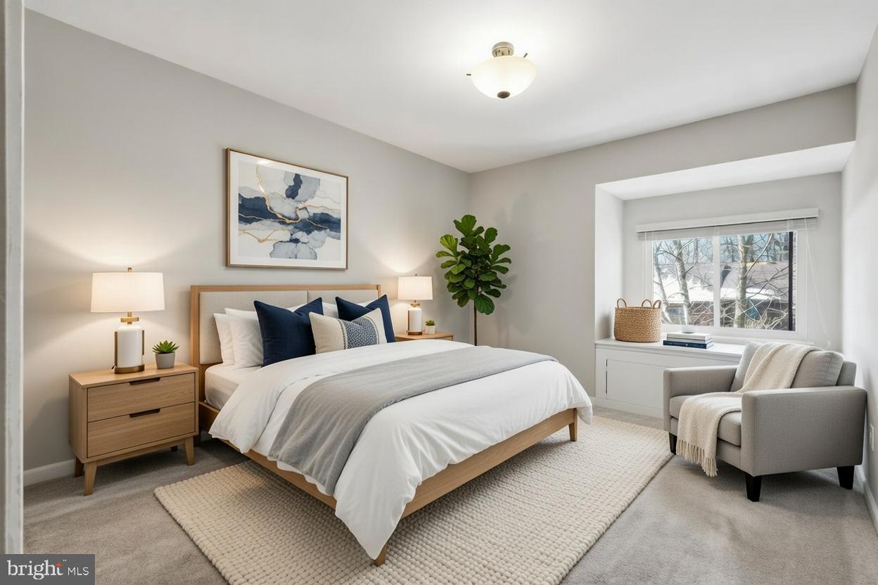 1942 Winterport Cl Reston, VA 20191 - Photo 15 of 19 a bedroom with bed and a couch