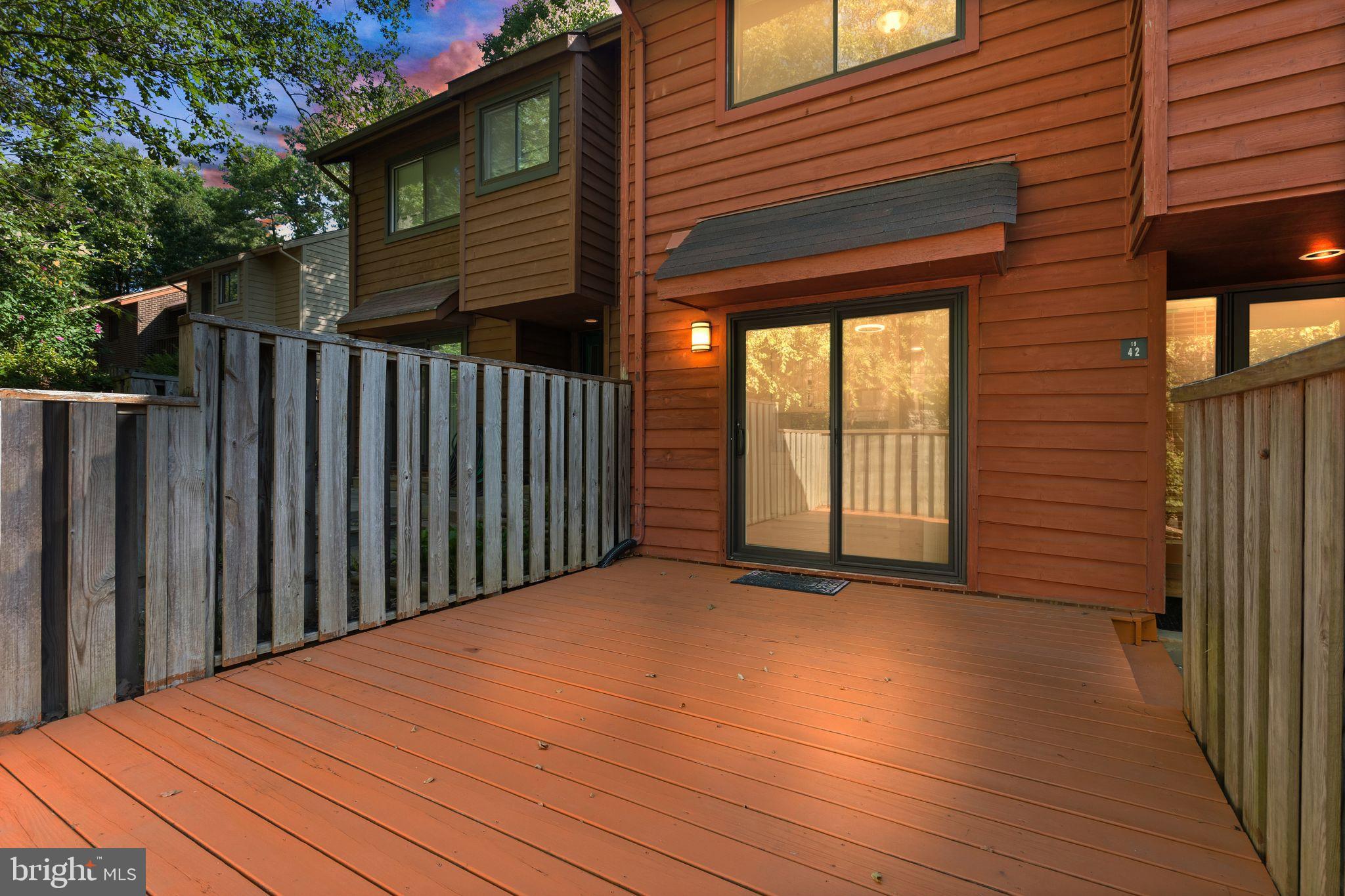1942 Winterport Cl Reston, VA 20191 - Photo 2 of 19 a view of a backyard of the house