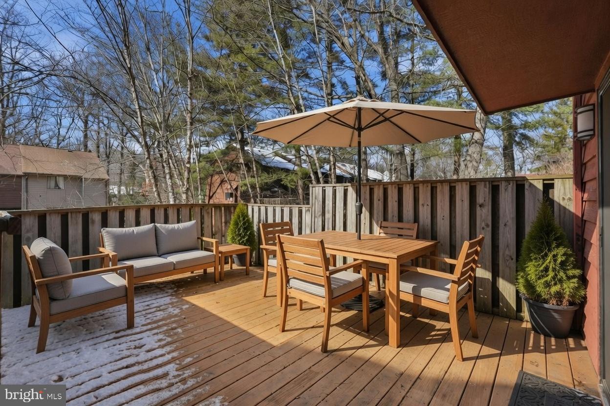 1942 Winterport Cl Reston, VA 20191 - Photo 8 of 19 a view of a backyard with a patio and wooden floor