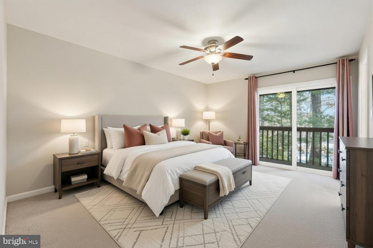 1942 Winterport Cl Reston, VA 20191 - Photo 10 of 19 a bedroom with a large bed and a chandelier