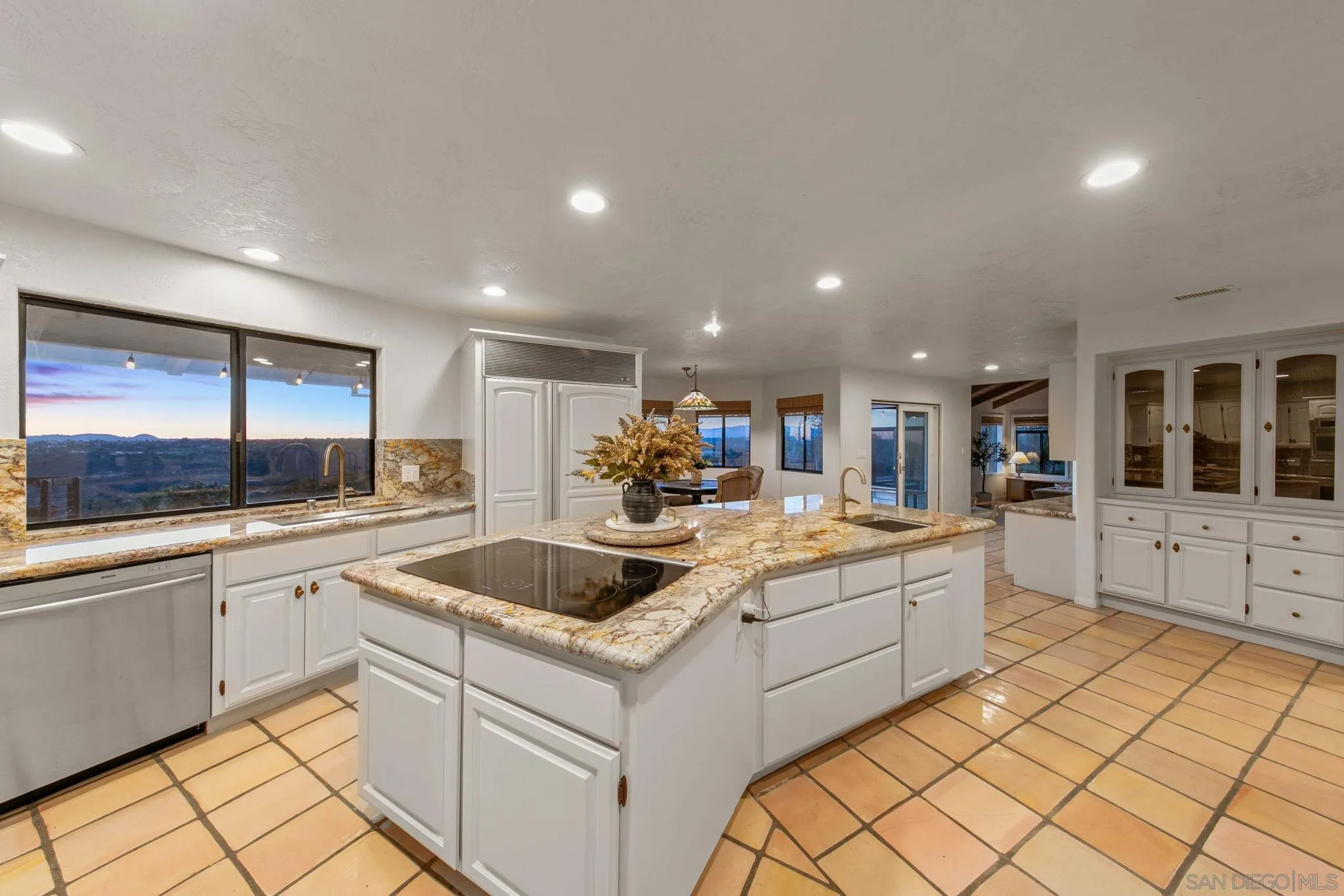 2323 Wilt Road Fallbrook, CA 92028 - Photo 15 of 28 a kitchen with a sink and cabinets