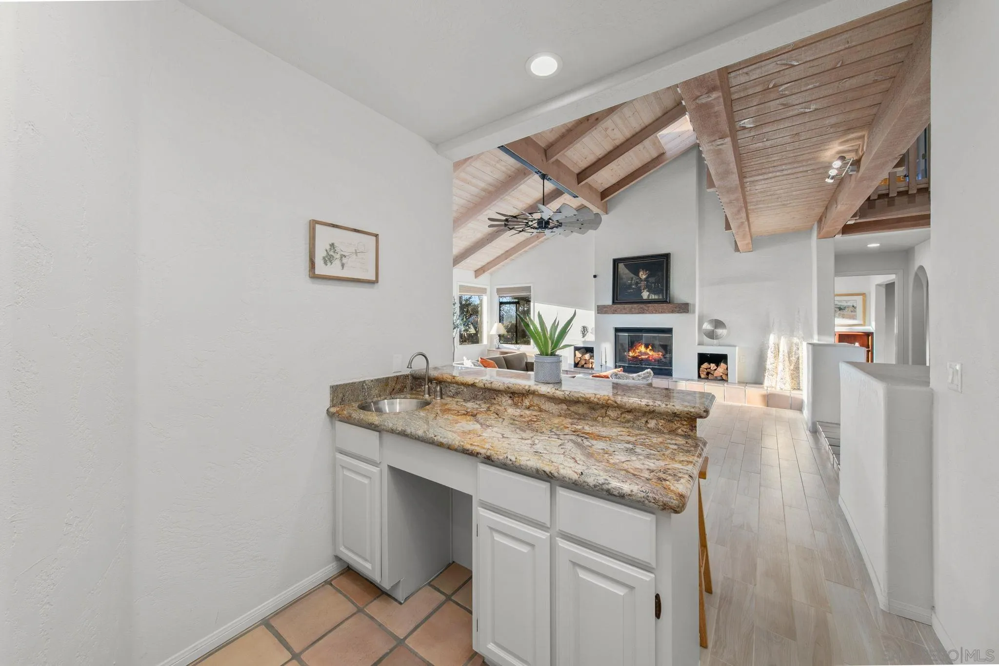 2323 Wilt Road Fallbrook, CA 92028 - Photo 18 of 28 a kitchen with stainless steel appliances granite countertop a sink and a wooden cabinets