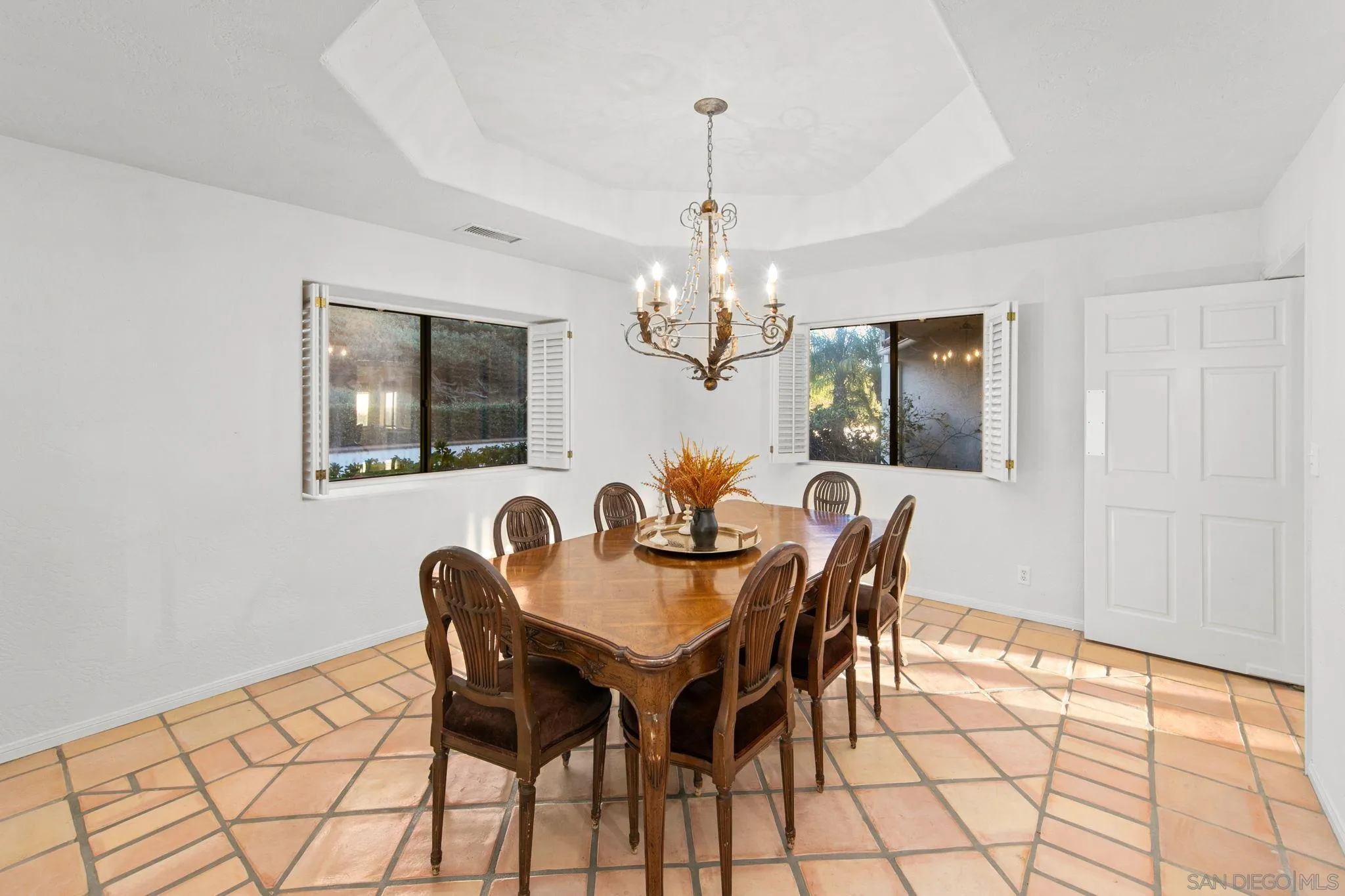 2323 Wilt Road Fallbrook, CA 92028 - Photo 19 of 28 a dining room with furniture and chandelier
