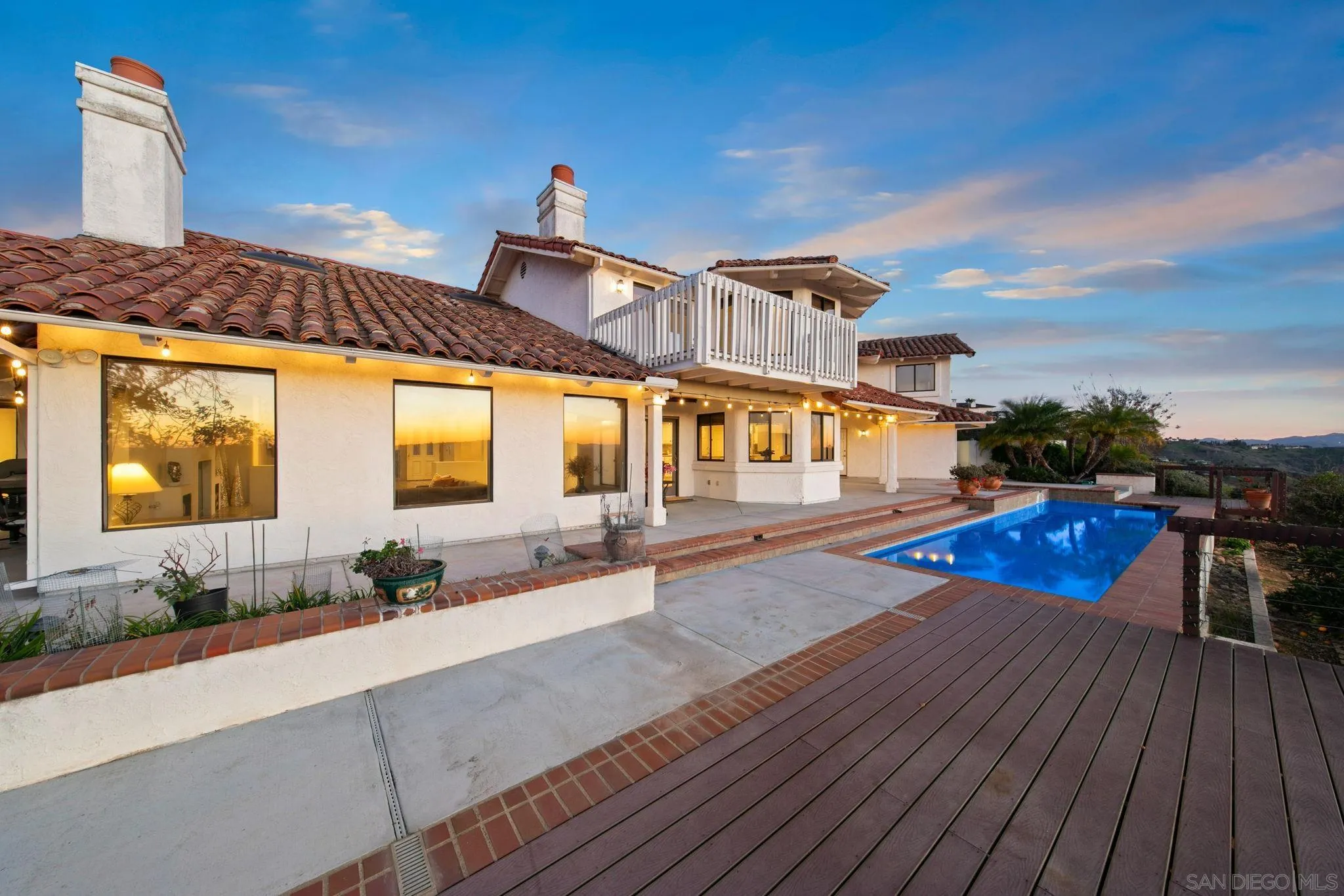 2323 Wilt Road Fallbrook, CA 92028 - Photo 26 of 28 a view of a house with wooden floor and a sitting area