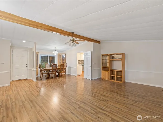 a view of a livingroom with furniture and wooden floor