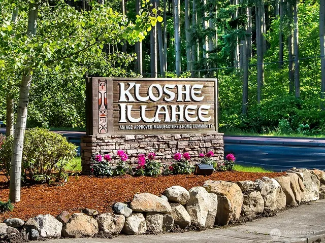 a sign on the side of the road