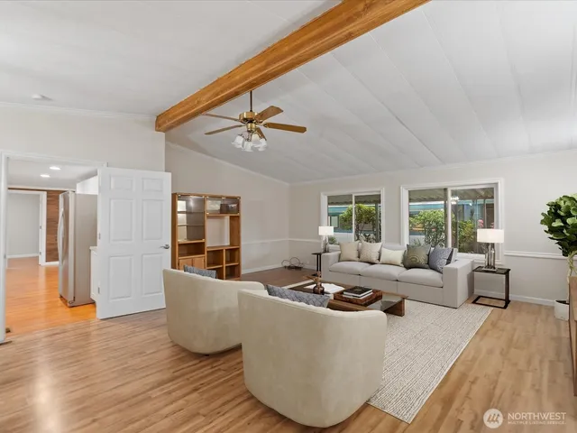a living room with furniture and window
