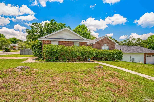 a view of a house with a big yard