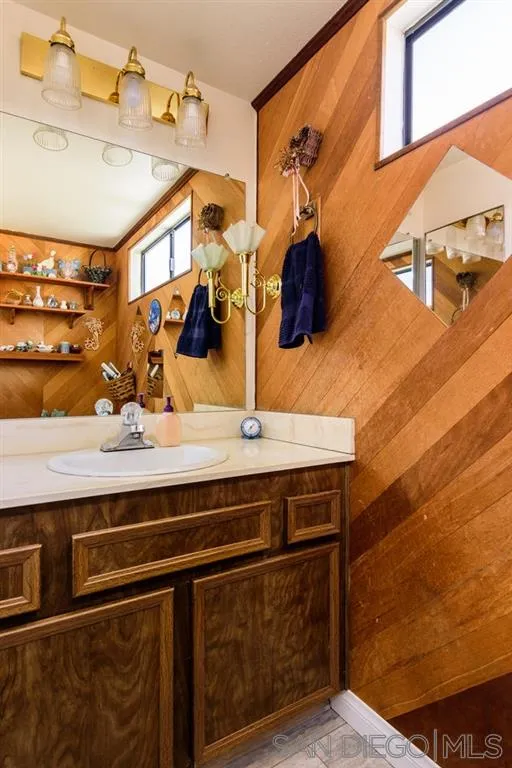 9204 Mast Boulevard, Unit 40 Santee, CA 92071 - Photo 12 of 21 a bathroom with a sink and a mirror