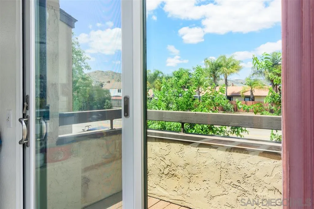 9204 Mast Boulevard, Unit 40 Santee, CA 92071 - Photo 14 of 21 a view of a glass door with a from a window