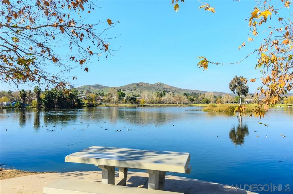 9204 Mast Boulevard, Unit 40 Santee, CA 92071 - Photo 21 of 21 a view of a lake with a table and chairs