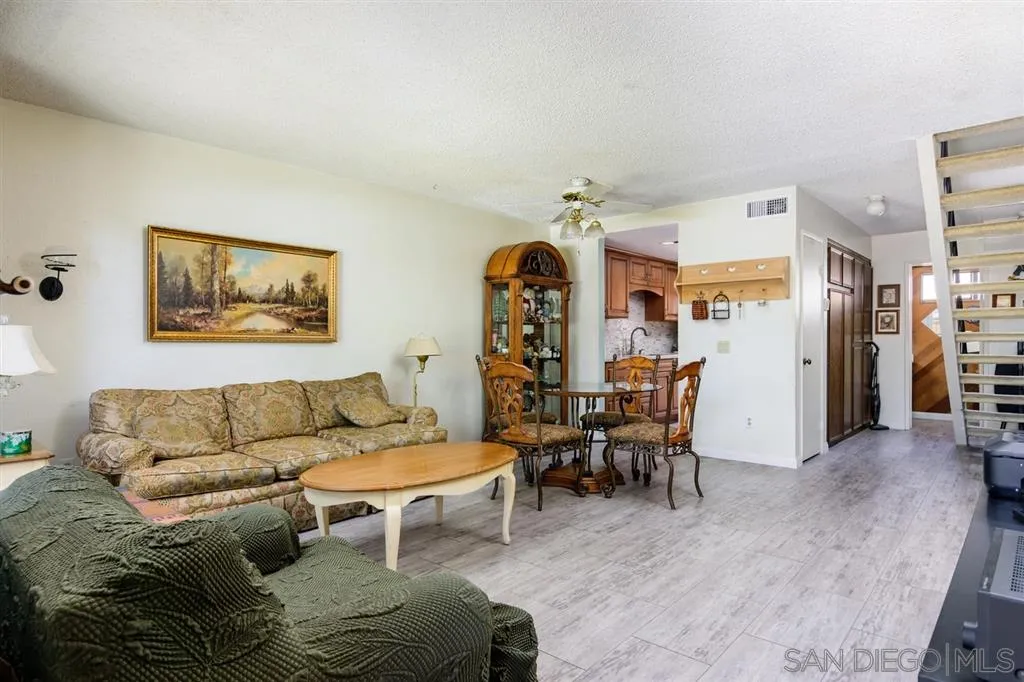 9204 Mast Boulevard, Unit 40 Santee, CA 92071 - Photo 7 of 21 a living room with furniture and wooden floor