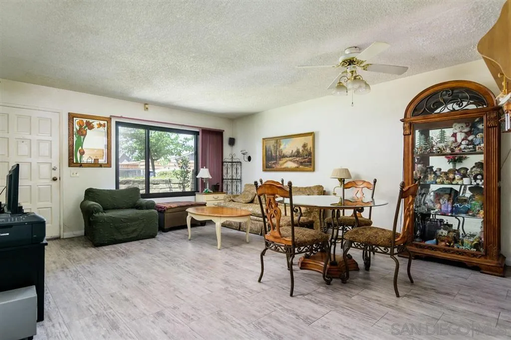 9204 Mast Boulevard, Unit 40 Santee, CA 92071 - Photo 8 of 21 a living room with furniture and a window