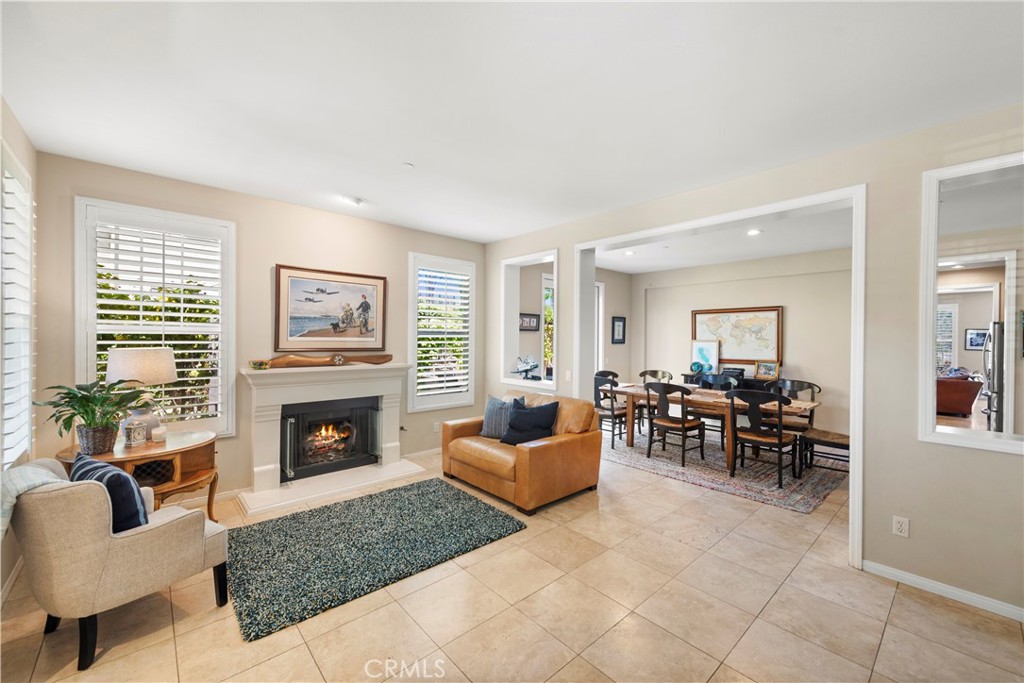 15 Corte Limonada San Clemente, CA 92673 - Photo 10 of 64 a living room with furniture and a fireplace