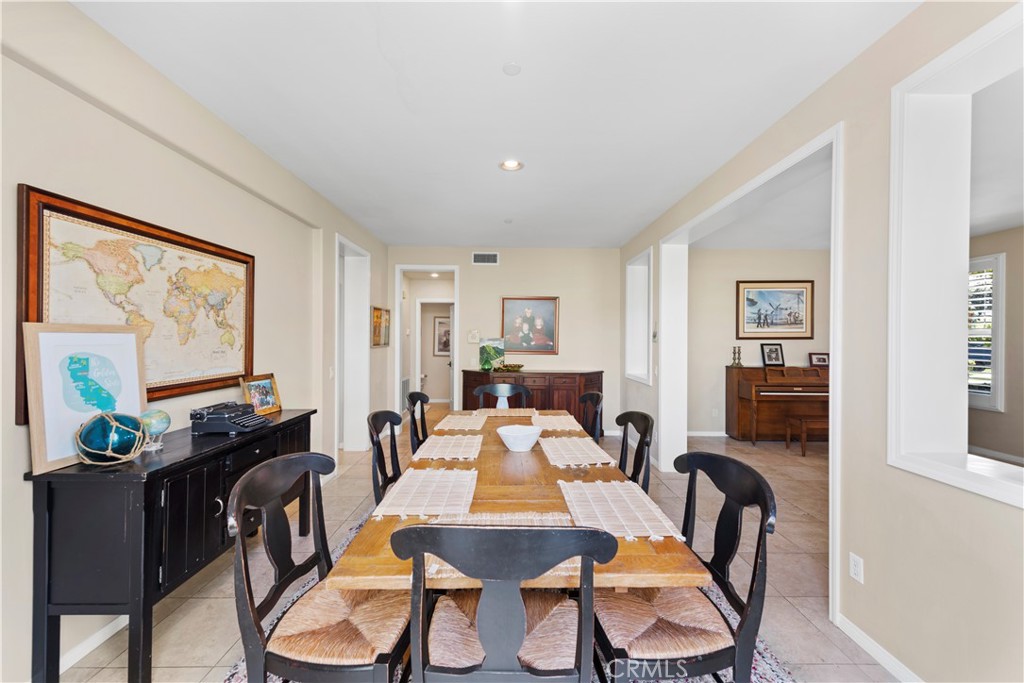 15 Corte Limonada San Clemente, CA 92673 - Photo 12 of 64 a view of a dining room with furniture window and wooden floor