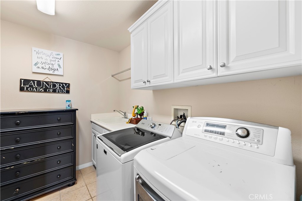 15 Corte Limonada San Clemente, CA 92673 - Photo 19 of 64 Downstairs laundry room